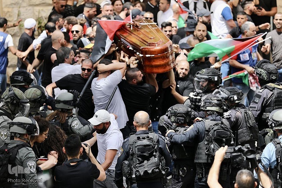 Israeli forces beat mourners who carried Abu Akleh's casket on Friday