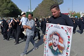 عکس | آیین تشییع و خاکسپاری پیکر مطهر شهید رضا رضایی در کوهدشت